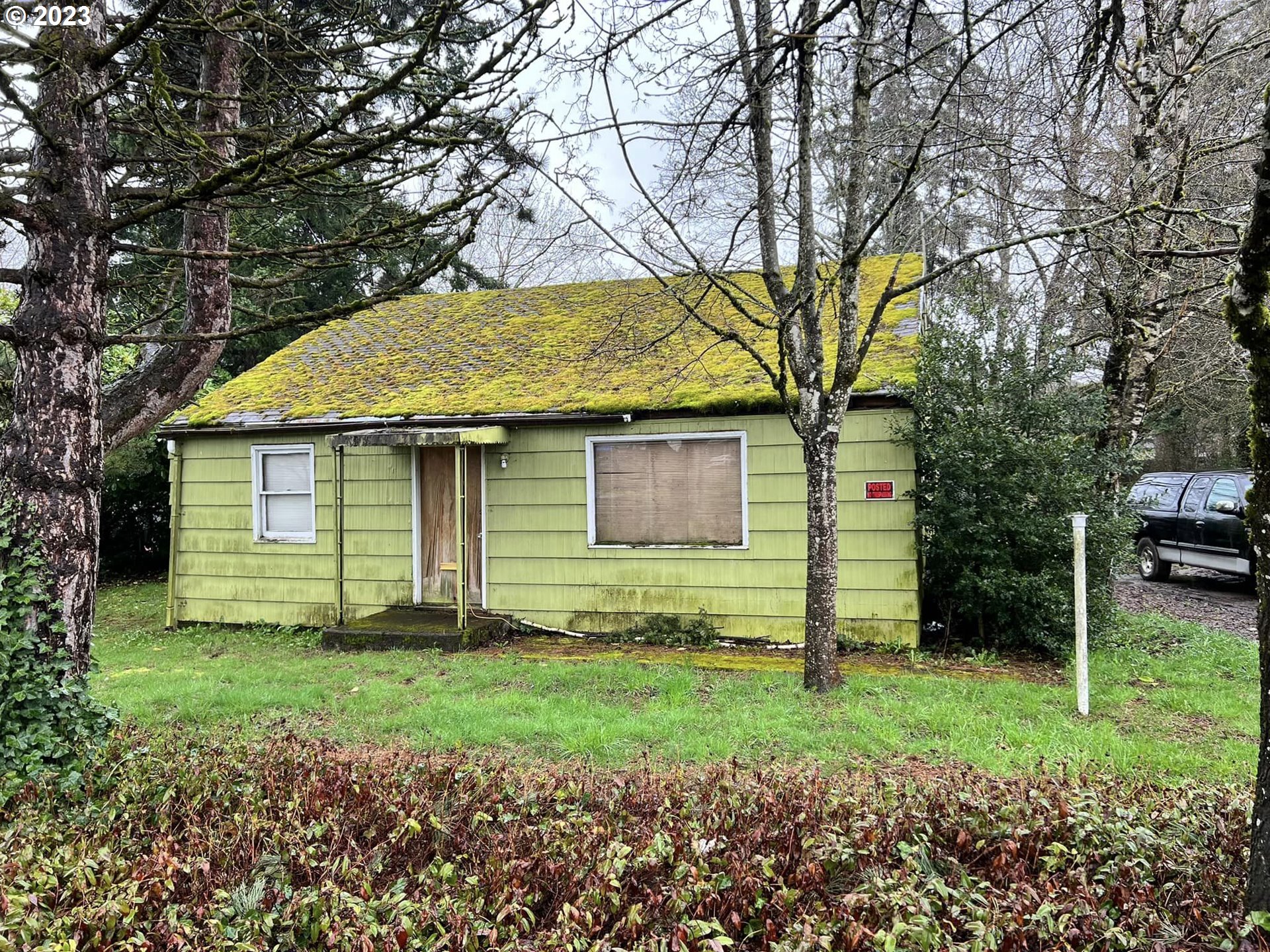 16920 East Burnside Street Portland, OR 97233 - Photo 1 of 8 a view of a house with a yard