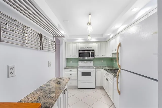 $2,000 | 255 Dolphin Point, Unit 414, Clearwater Beach, FL 33767