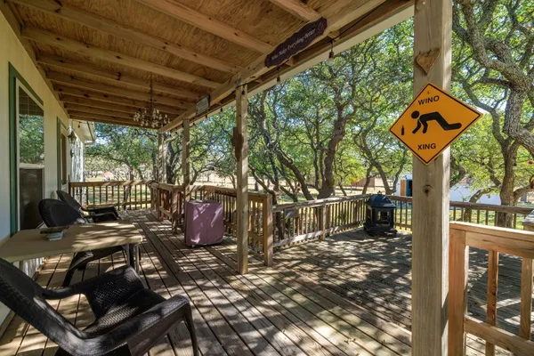 a view of a chairs and table in the patio
