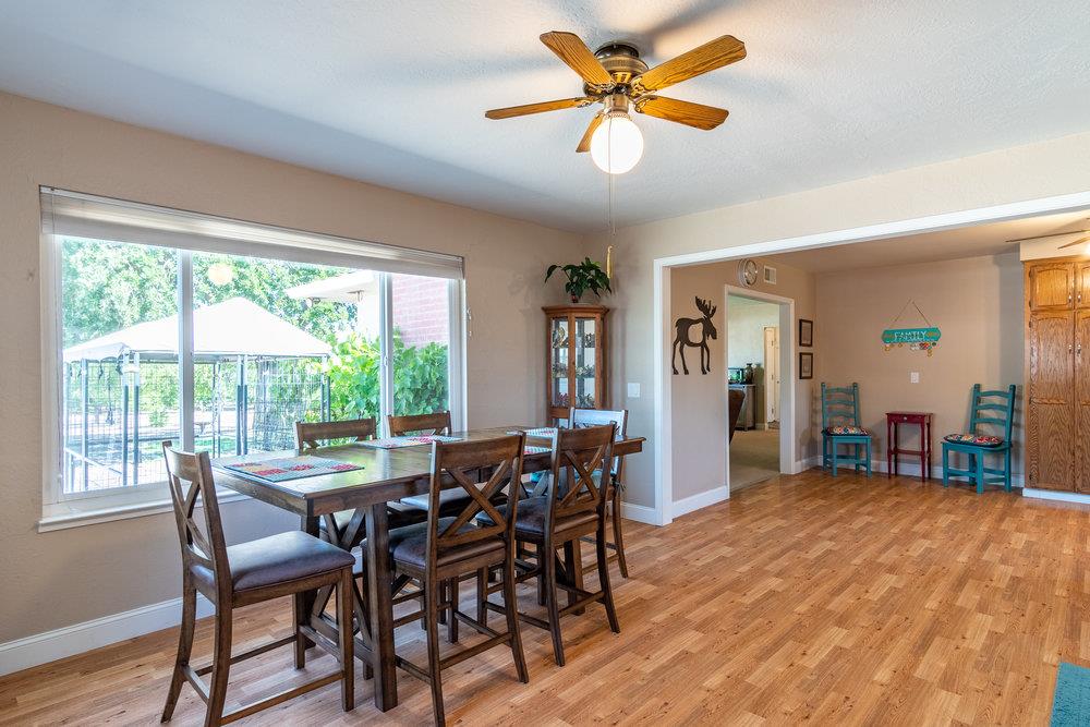 1177 Orchard Road Hollister, CA 95023 - Photo 17 of 79 a view of a dining room with furniture window and outside view