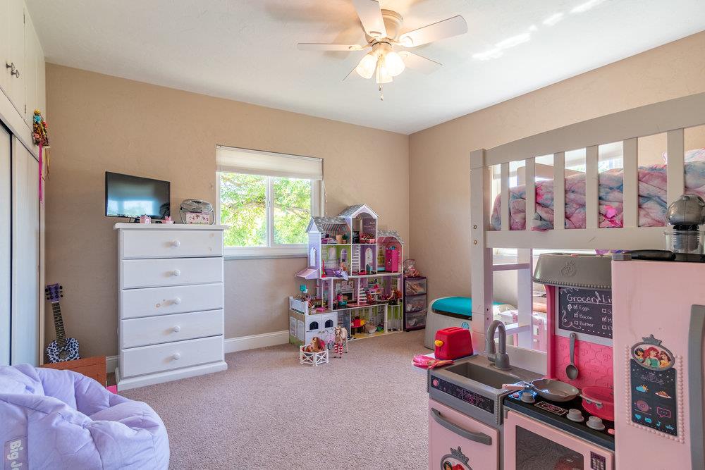 1177 Orchard Road Hollister, CA 95023 - Photo 24 of 79 a bed room with a bed and a window