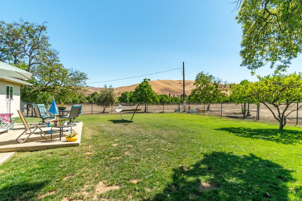 1177 Orchard Road Hollister, CA 95023 - Photo 28 of 79 a view of a park with swings and slides