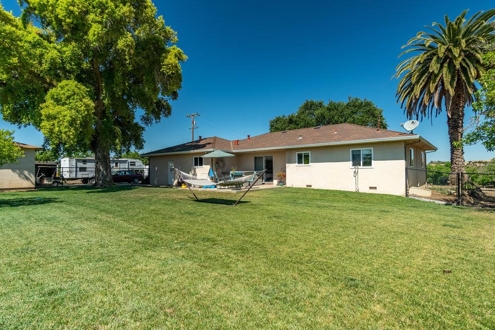 1177 Orchard Road Hollister, CA 95023 - Photo 30 of 79 a front view of a house with a garden