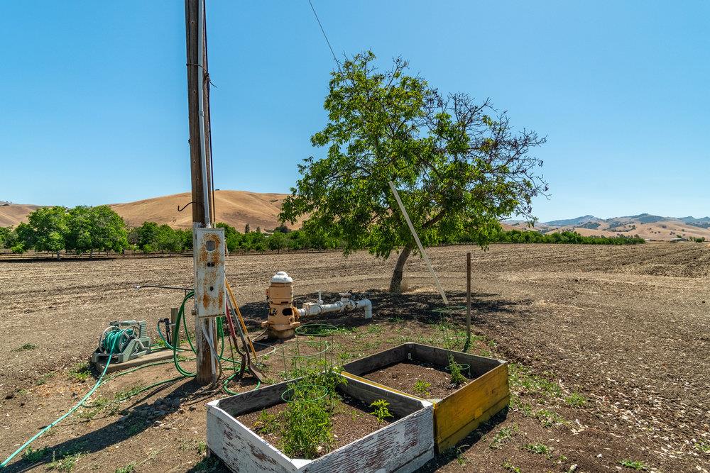 1177 Orchard Road Hollister, CA 95023 - Photo 31 of 79 a view of a lake with a yard