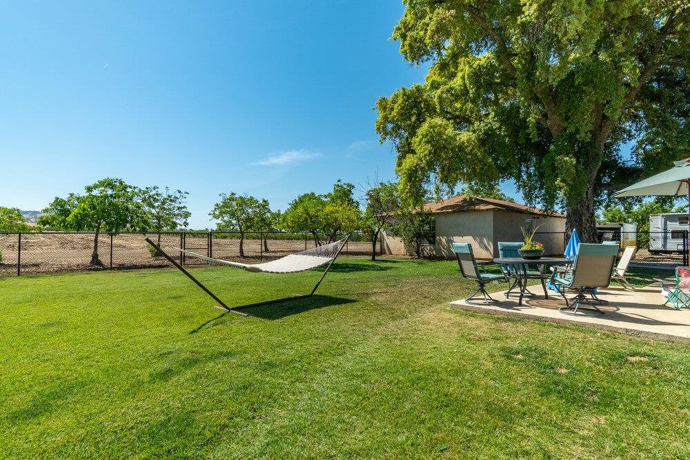 1177 Orchard Road Hollister, CA 95023 - Photo 32 of 79 a view of a park with bench and a slide
