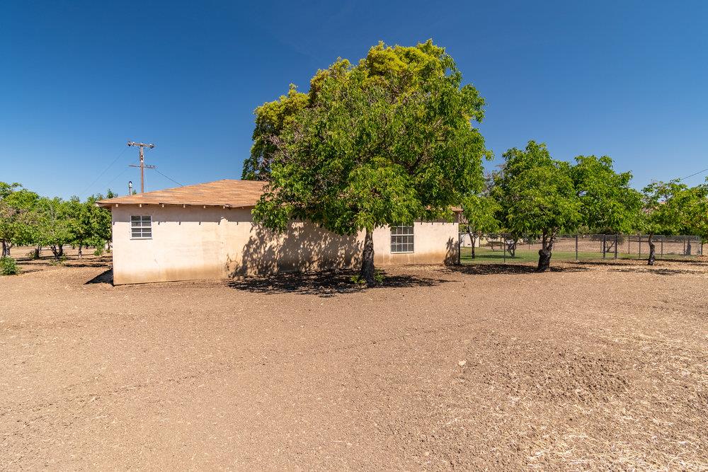 1177 Orchard Road Hollister, CA 95023 - Photo 41 of 79 a front view of a house with a yard and a garage