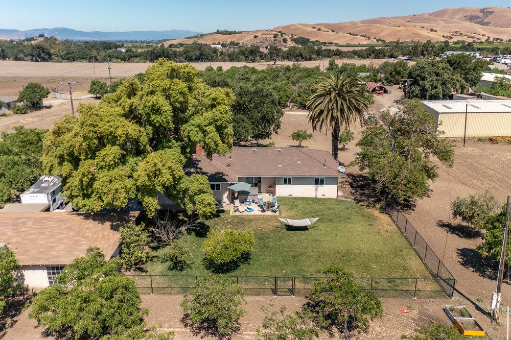 1177 Orchard Road Hollister, CA 95023 - Photo 71 of 79 an aerial view of residential houses with outdoor space and river