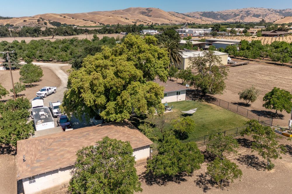 1177 Orchard Road Hollister, CA 95023 - Photo 72 of 79 an aerial view of residential houses with outdoor space and river