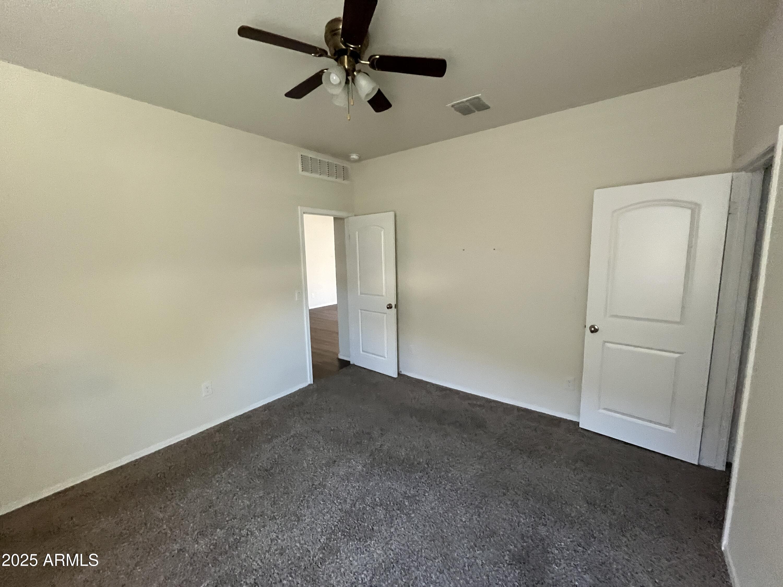 30968 West Picadilly Road Buckeye, AZ 85396 - Photo 15 of 21 an empty room with fan