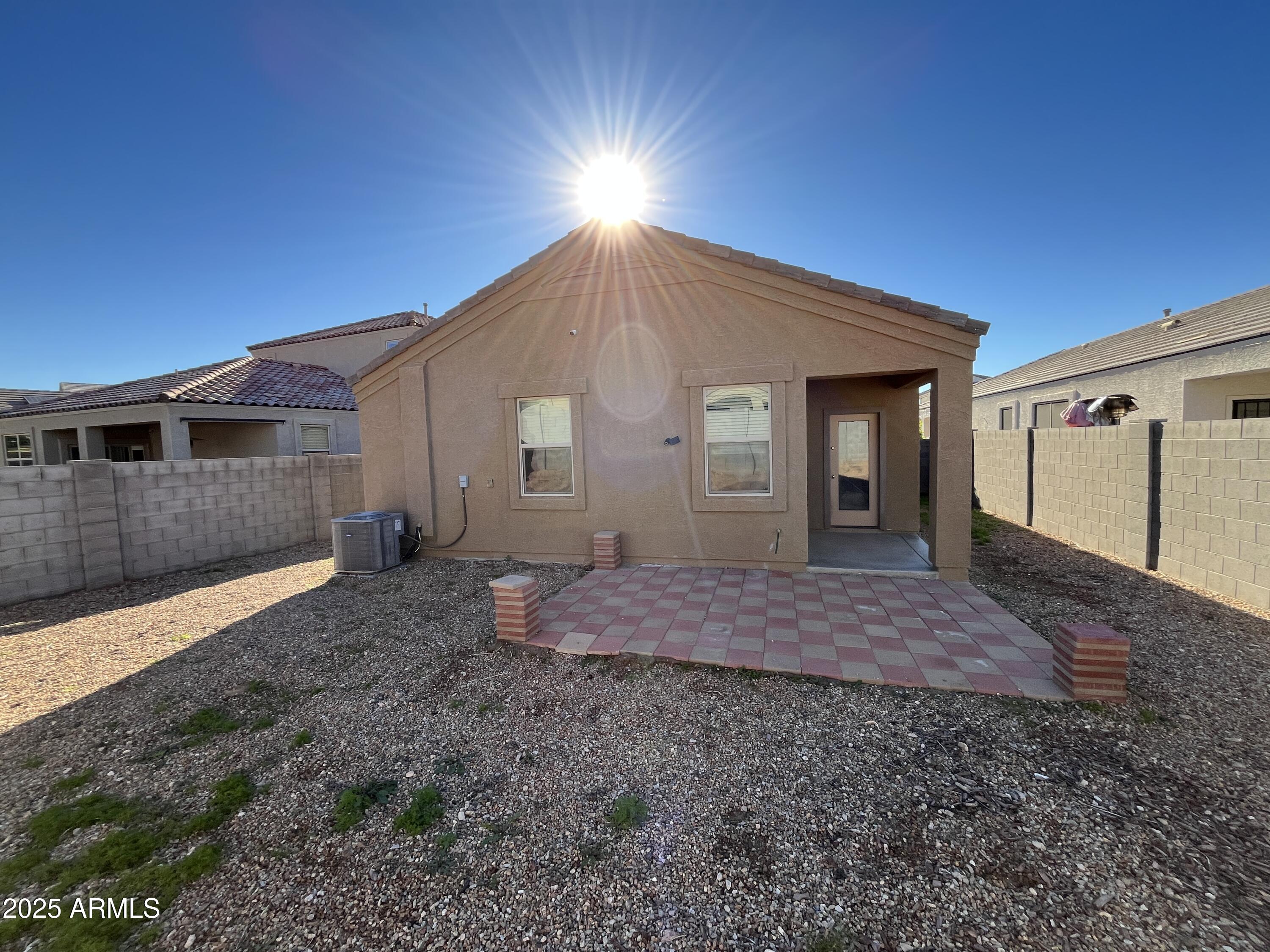 30968 West Picadilly Road Buckeye, AZ 85396 - Photo 20 of 21 a house view with a backyard space
