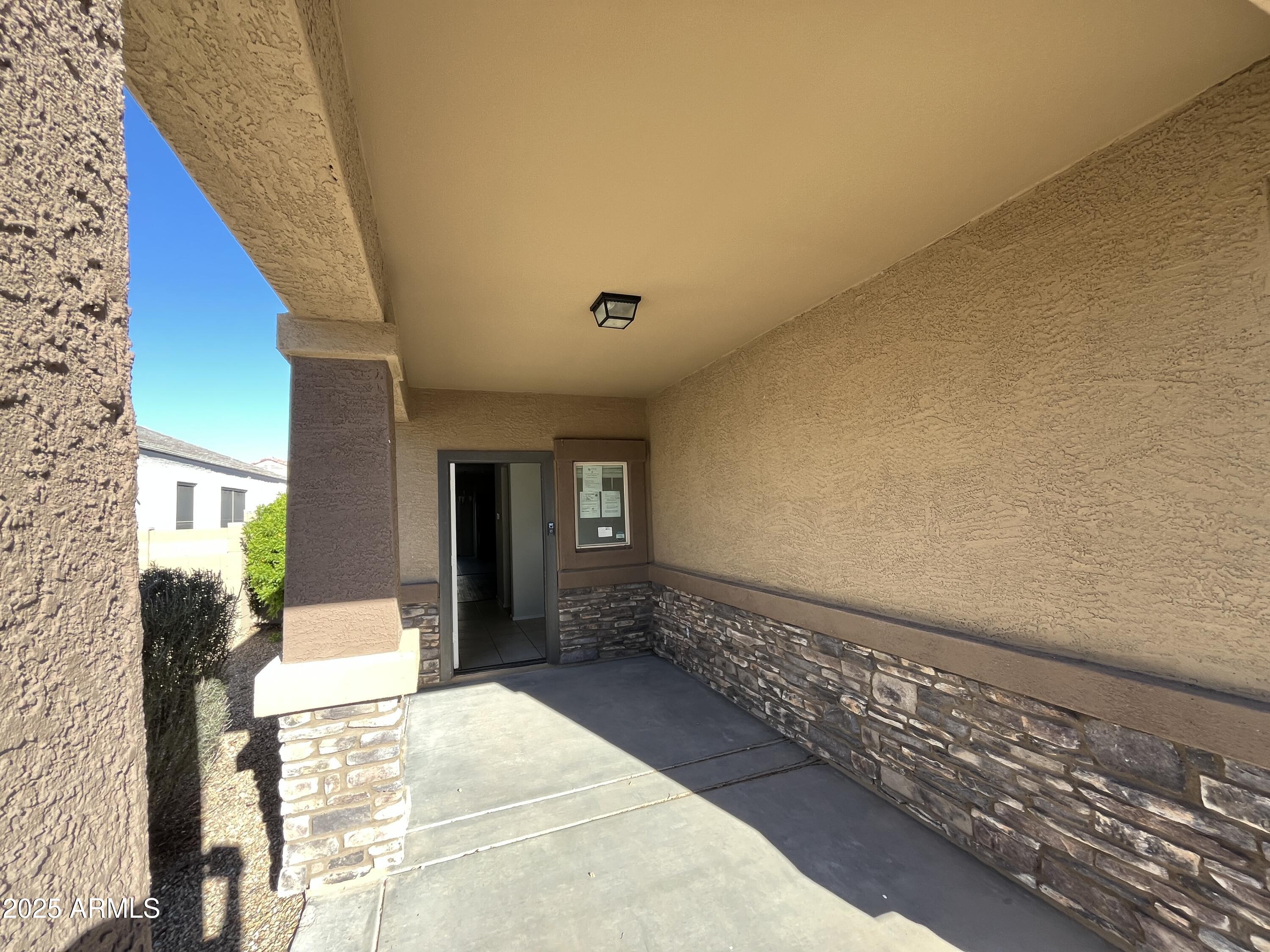 30968 West Picadilly Road Buckeye, AZ 85396 - Photo 2 of 21 a view of a balcony