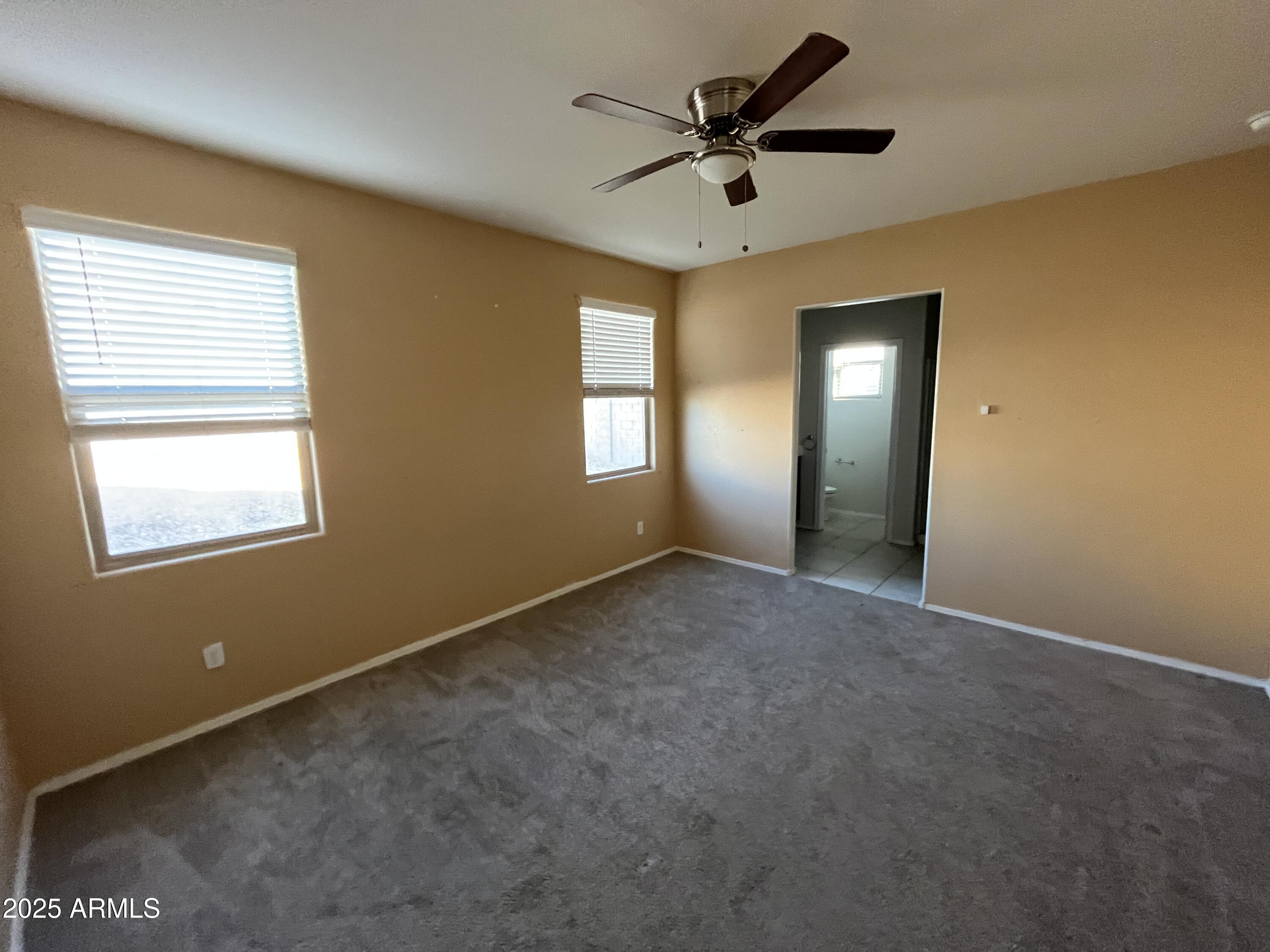 30968 West Picadilly Road Buckeye, AZ 85396 - Photo 8 of 21 a view of a livingroom with a window