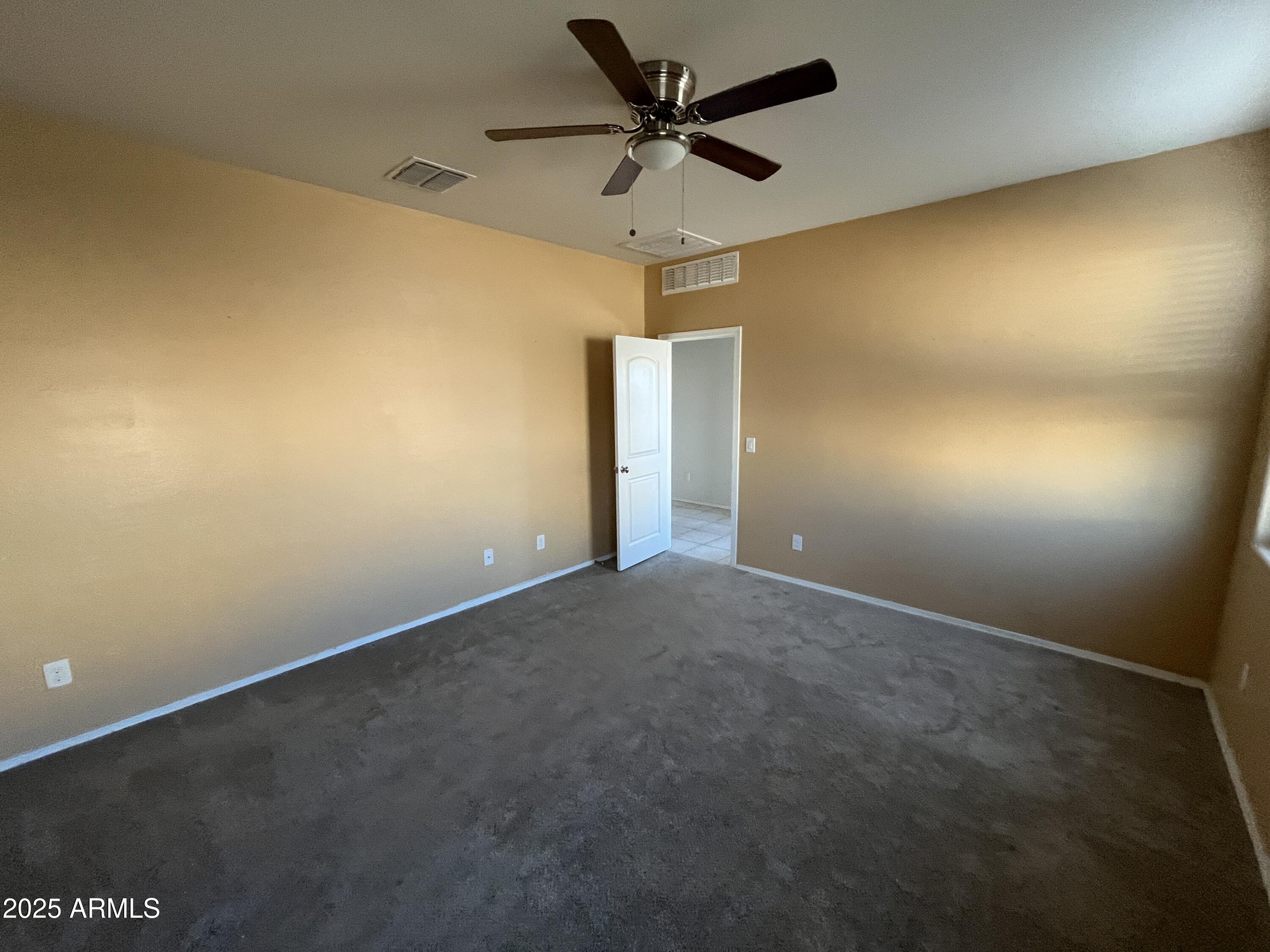 30968 West Picadilly Road Buckeye, AZ 85396 - Photo 9 of 21 a view of an empty room