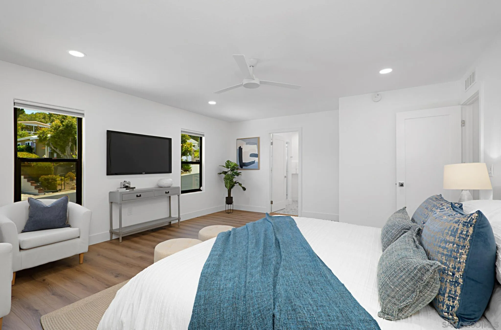 2282 Morgan Road Carlsbad, CA 92008 - Photo 12 of 28 a bedroom with furniture and a flat screen tv