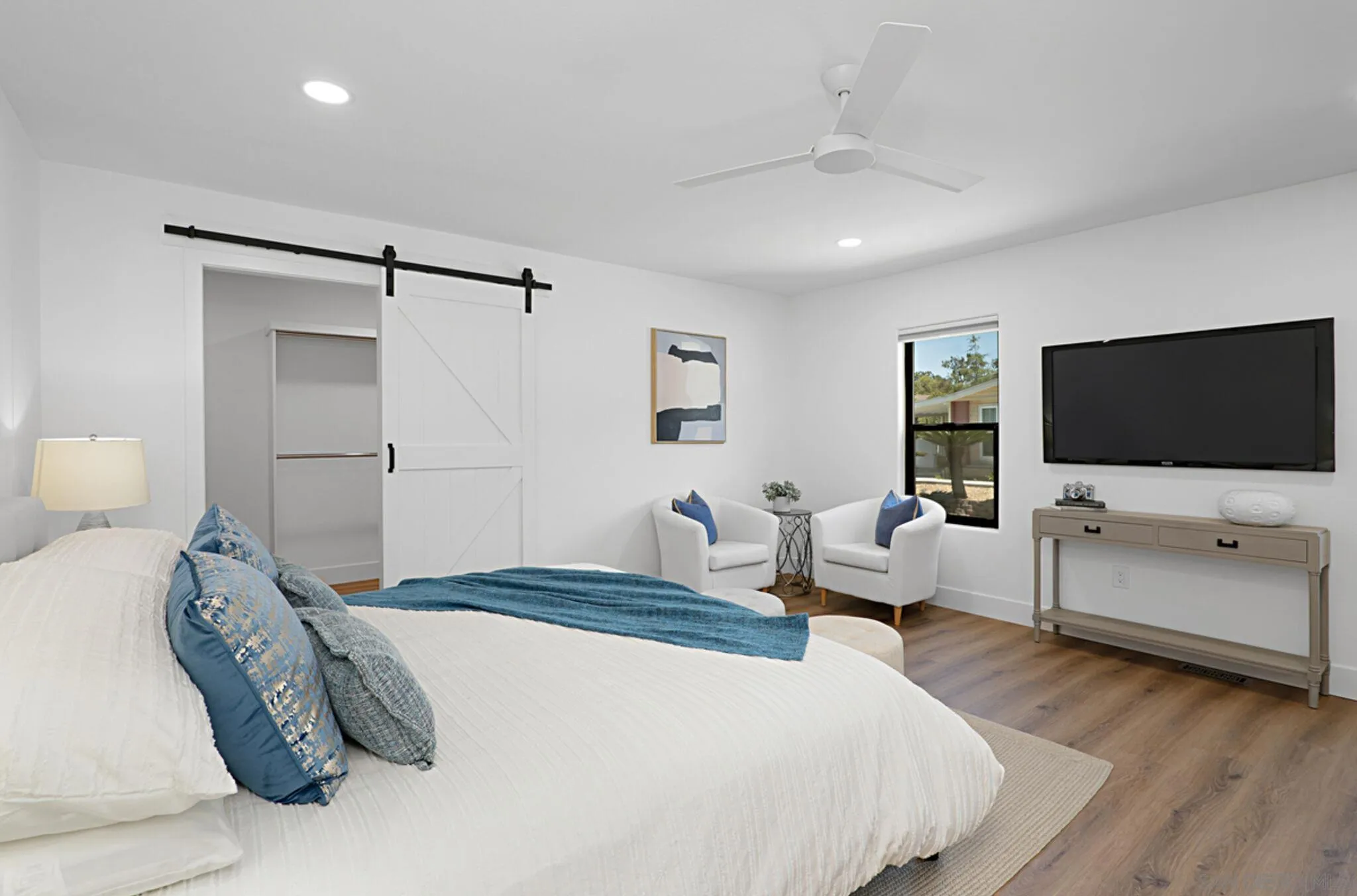 2282 Morgan Road Carlsbad, CA 92008 - Photo 13 of 28 a bedroom with a bed and a flat screen tv