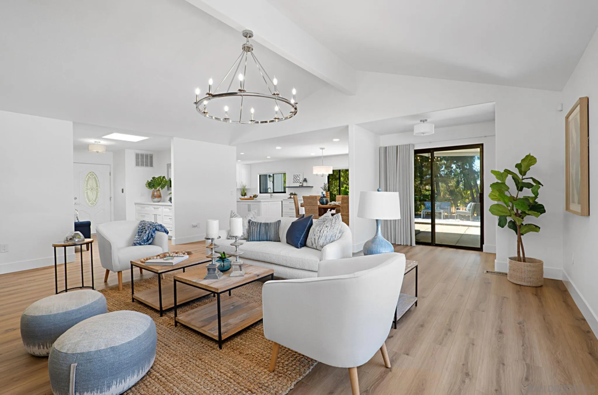 2282 Morgan Road Carlsbad, CA 92008 - Photo 8 of 28 a living room with furniture wooden floor and a chandelier