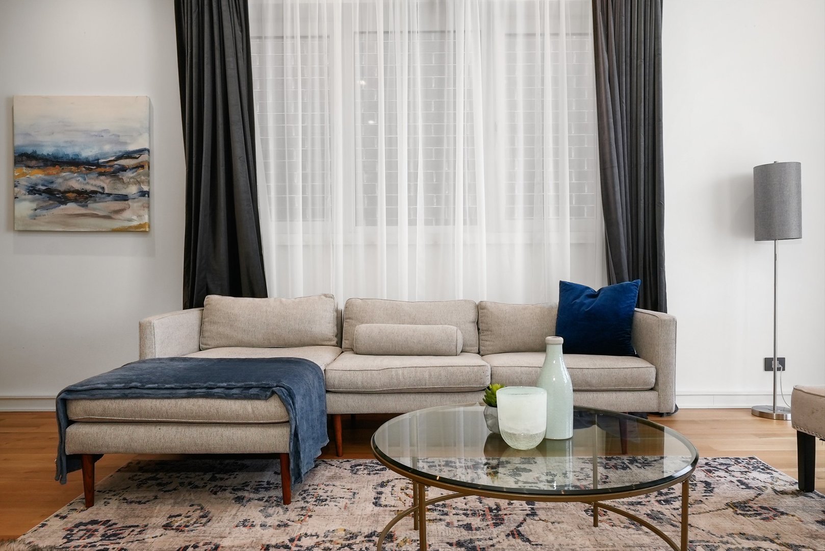 1605 West Ohio Street, Unit 2 Chicago, IL 60622 - Photo 15 of 38 a living room with furniture and a large window