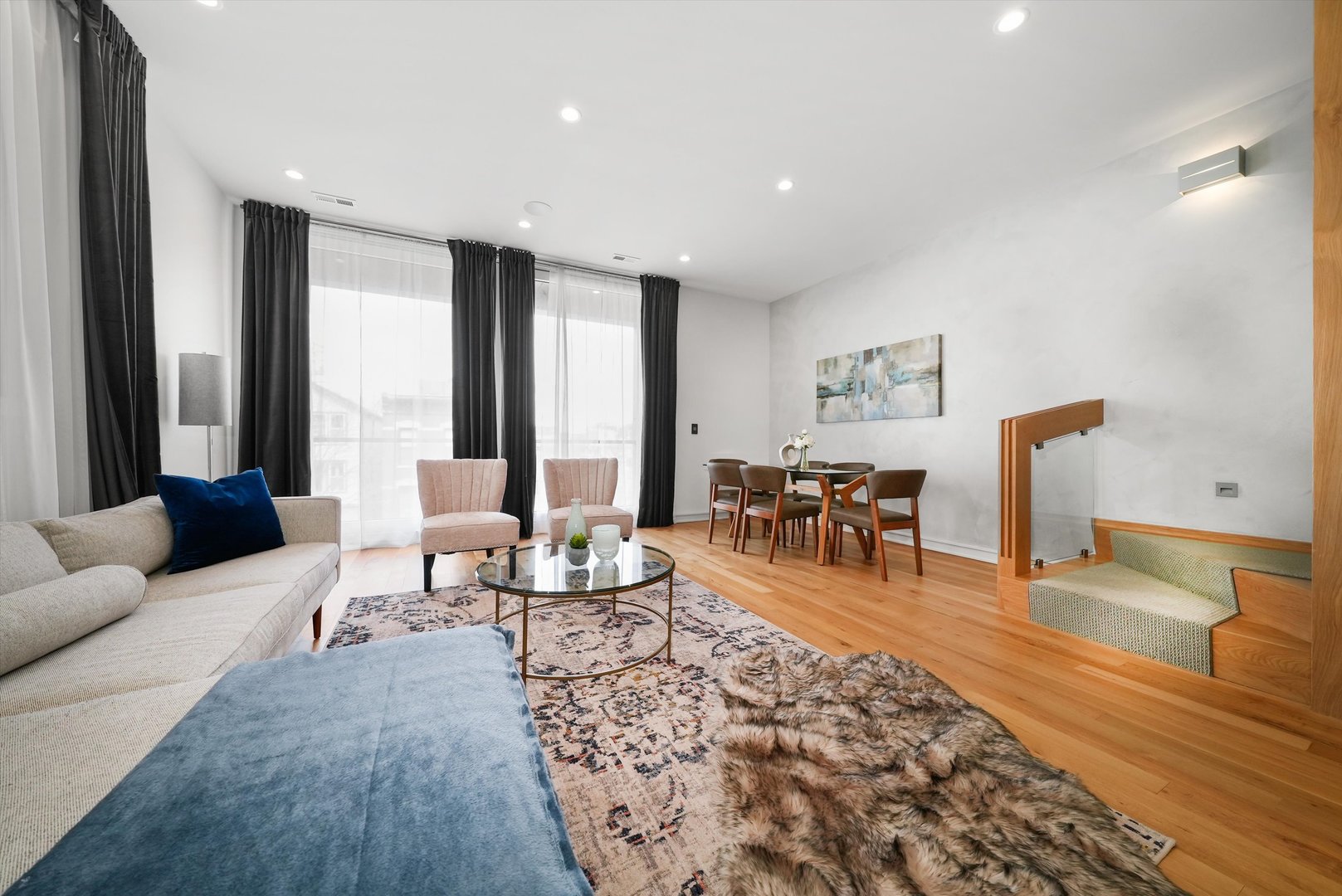 1605 West Ohio Street, Unit 2 Chicago, IL 60622 - Photo 17 of 38 a living room with furniture and next to a large window