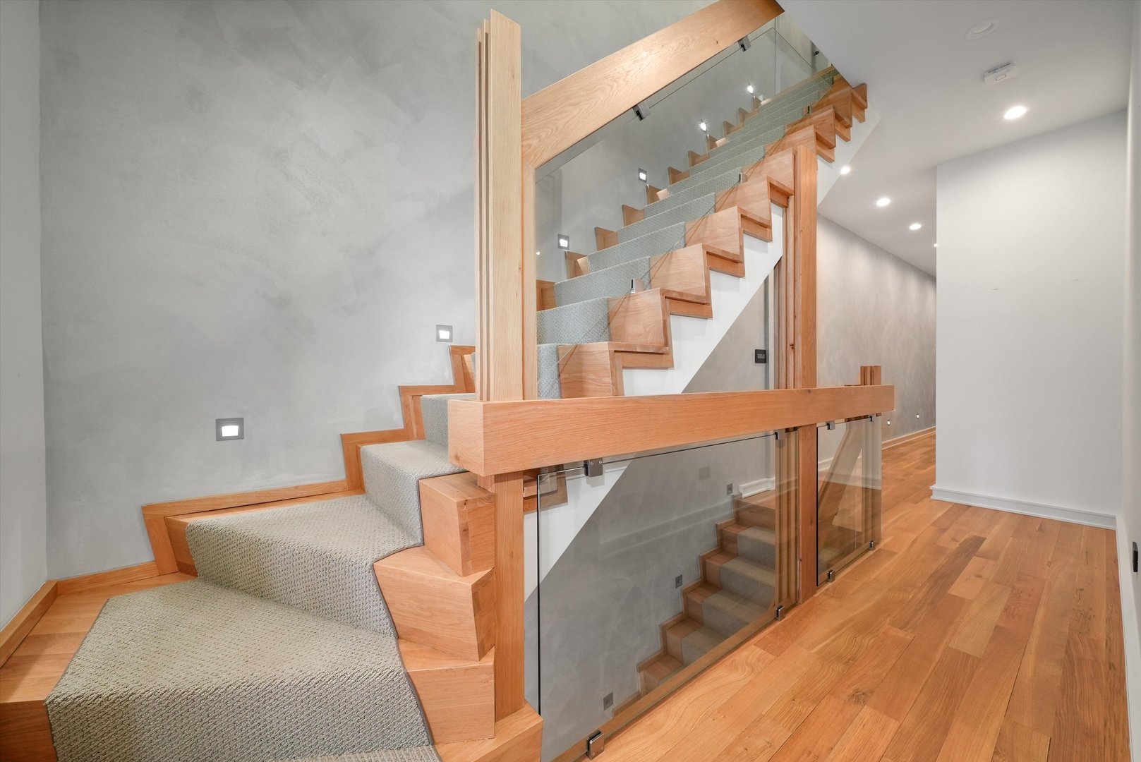 1605 West Ohio Street, Unit 2 Chicago, IL 60622 - Photo 21 of 38 a balcony with chairs and wooden floor