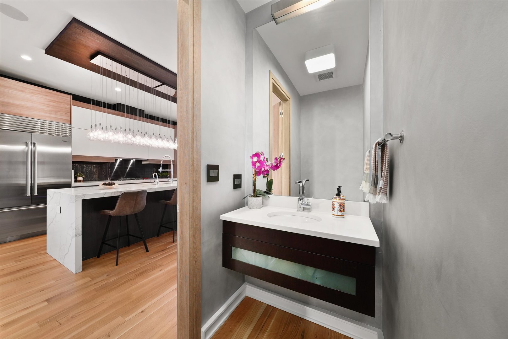 1605 West Ohio Street, Unit 2 Chicago, IL 60622 - Photo 22 of 38 a kitchen with a sink and a stove top oven