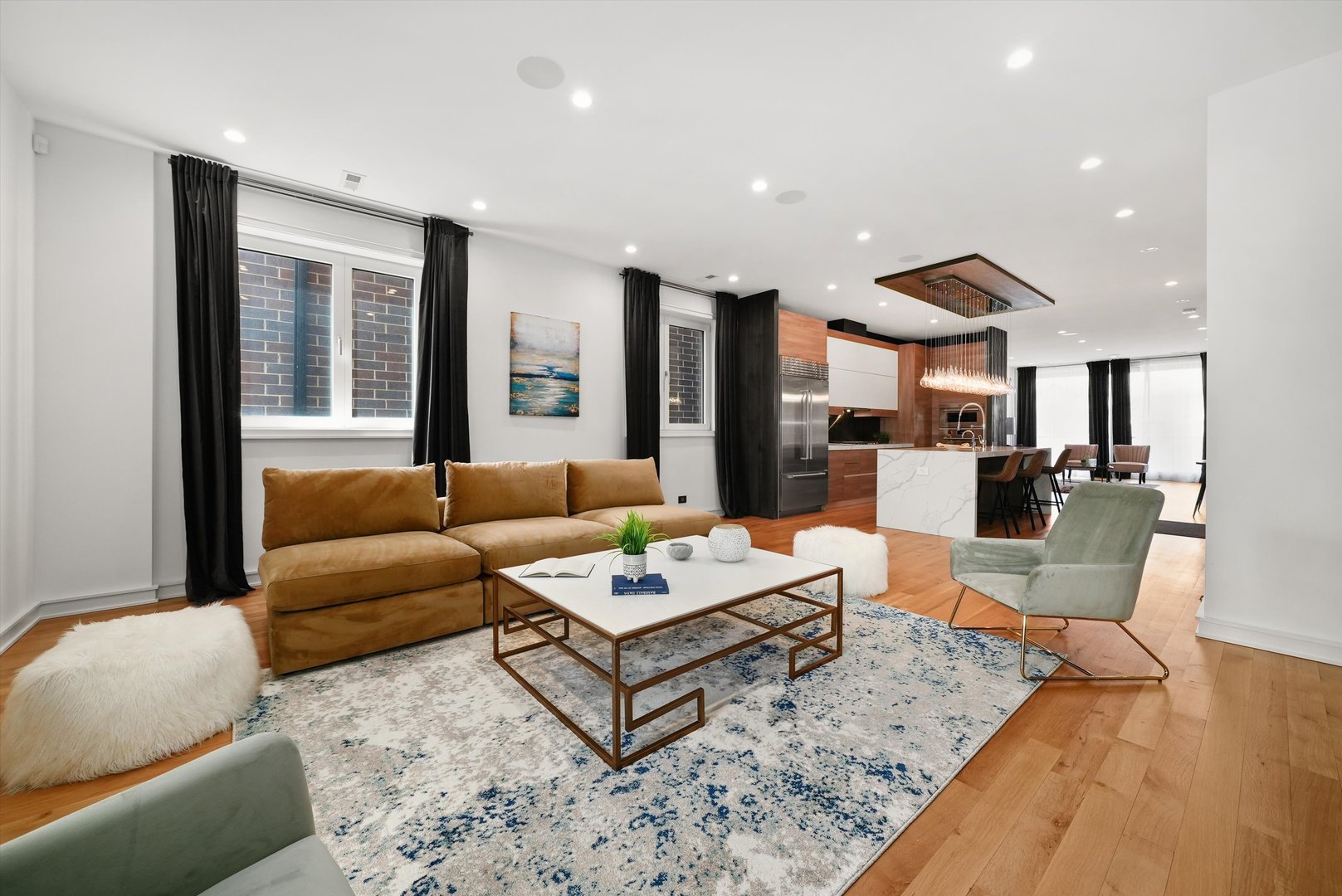 1605 West Ohio Street, Unit 2 Chicago, IL 60622 - Photo 23 of 38 a living room with furniture and a table