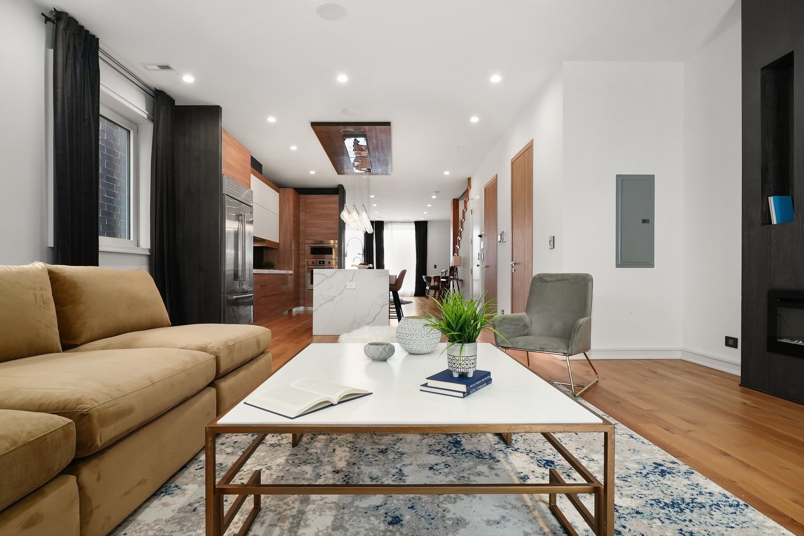 1605 West Ohio Street, Unit 2 Chicago, IL 60622 - Photo 25 of 38 a living room with furniture a flat screen tv and a table