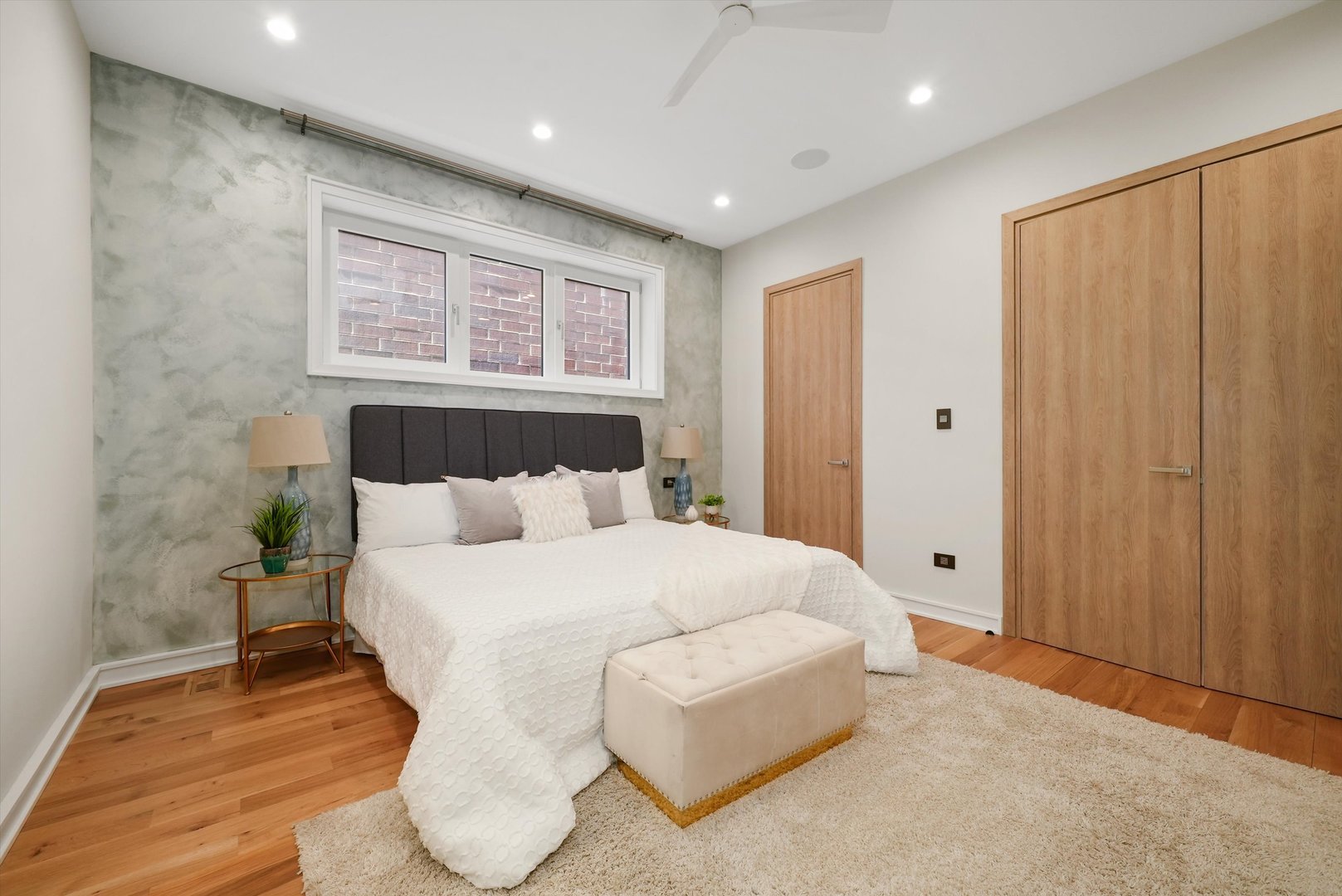 1605 West Ohio Street, Unit 2 Chicago, IL 60622 - Photo 27 of 38 a large white bed in a white room