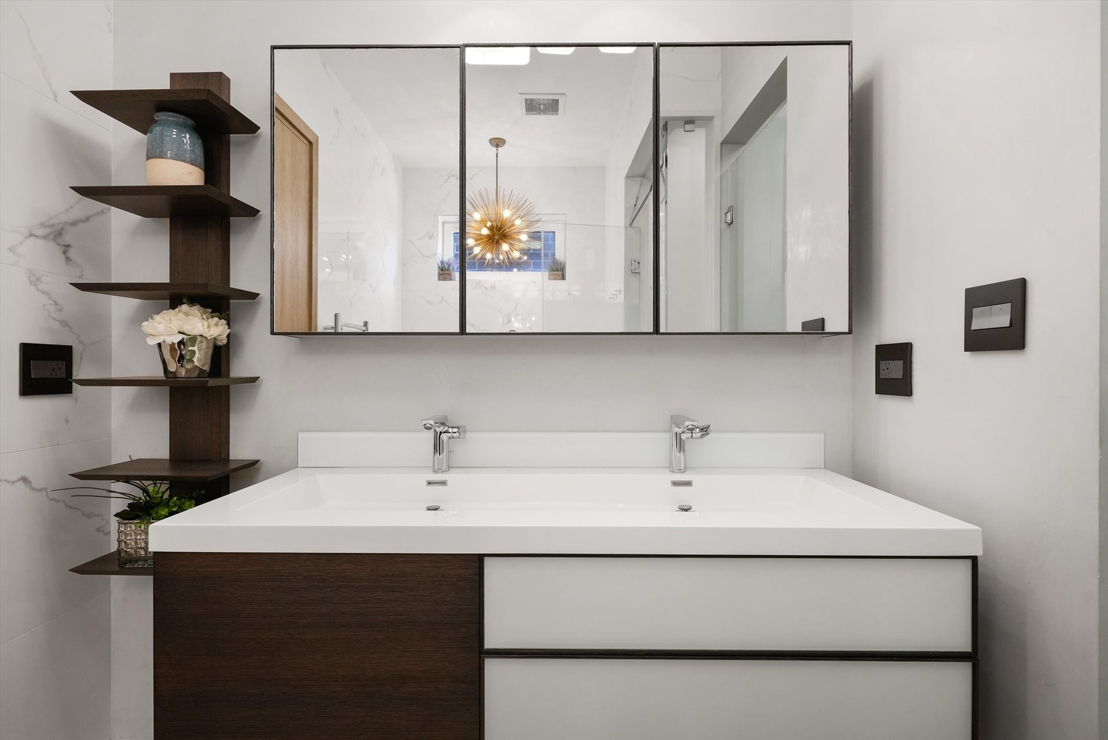 1605 West Ohio Street, Unit 2 Chicago, IL 60622 - Photo 29 of 38 a bathroom with a sink and a mirror