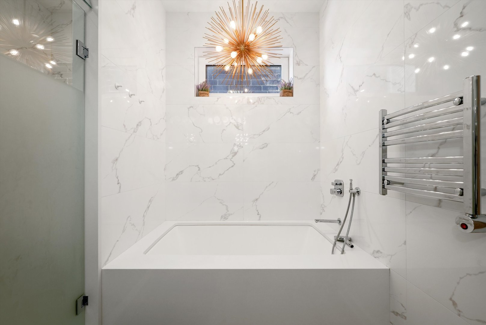 1605 West Ohio Street, Unit 2 Chicago, IL 60622 - Photo 30 of 38 a bathroom with a bathtub and a shower