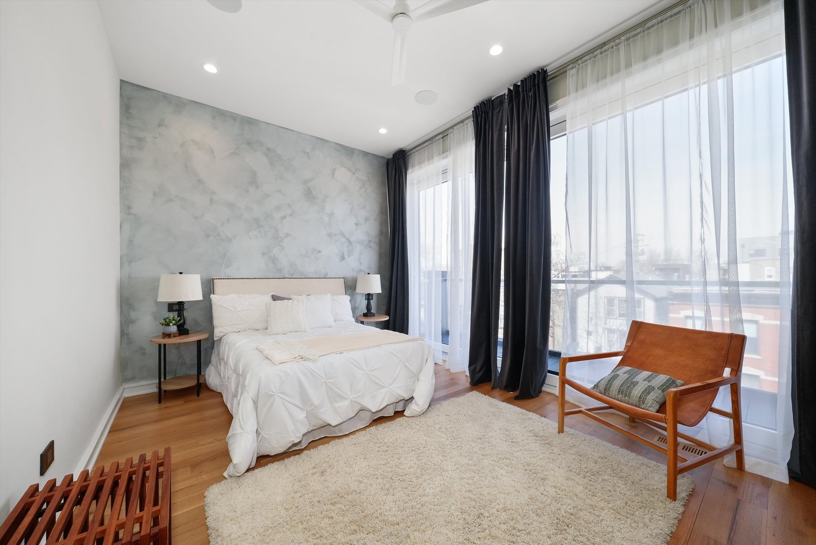 1605 West Ohio Street, Unit 2 Chicago, IL 60622 - Photo 31 of 38 a bedroom with a bed and a couch