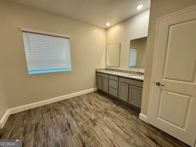 a bathroom with a sink and a toilet