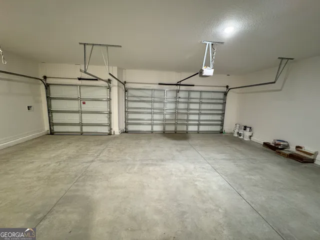 a view of a room with yard from balcony