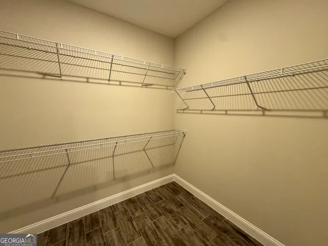 a view of a room with racks on the wall