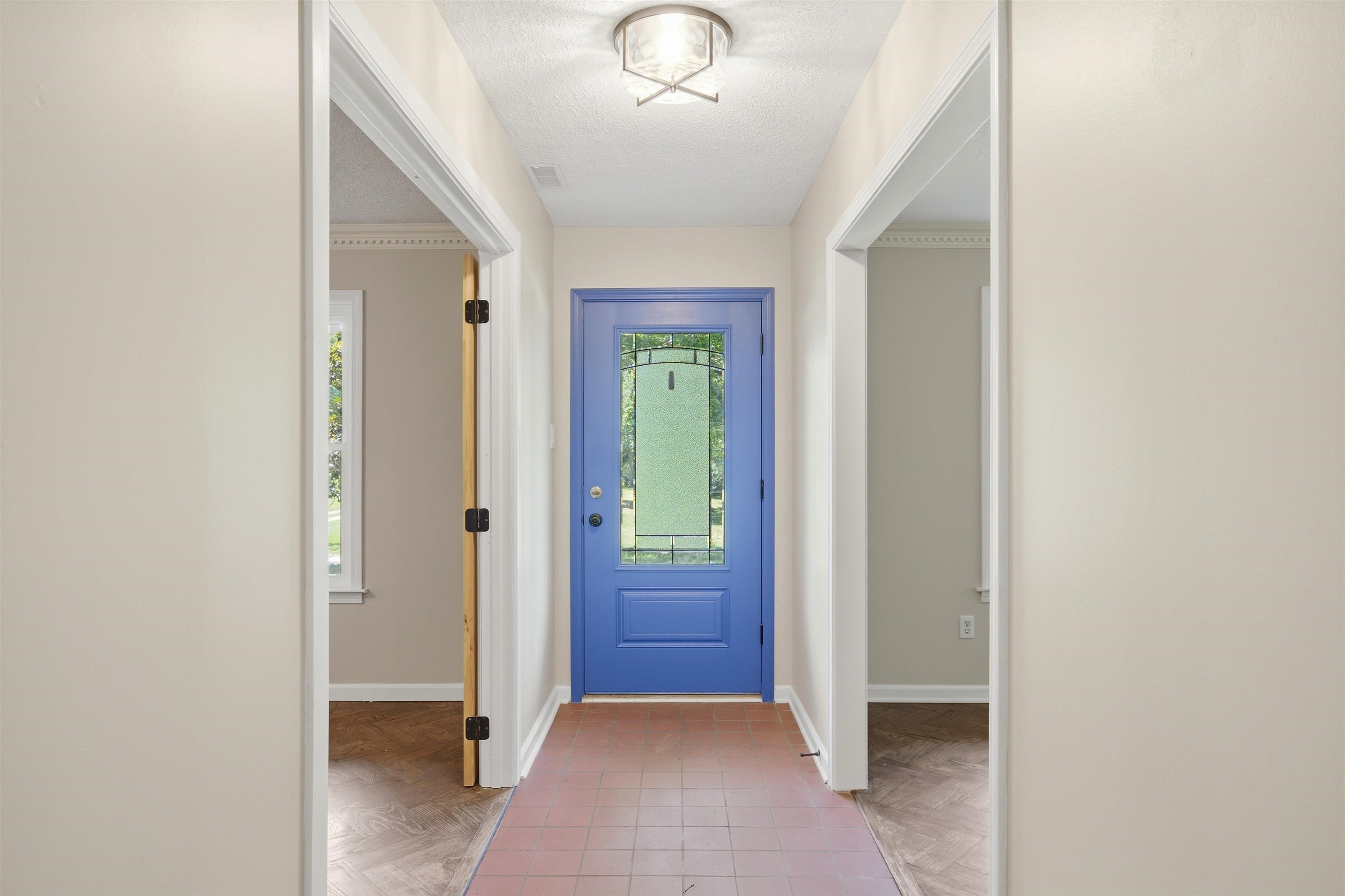 1370 North Reid Hooker Road Eads, TN 38028 - Photo 16 of 39 Entryway featuring a blue paneled door with decorative glass, tiled flooring, a flush-mount ceiling light fixture, and light-toned wall finishes