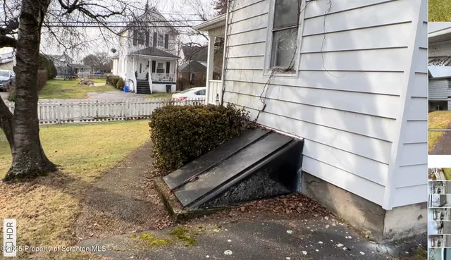 a view of a bench in the backyard