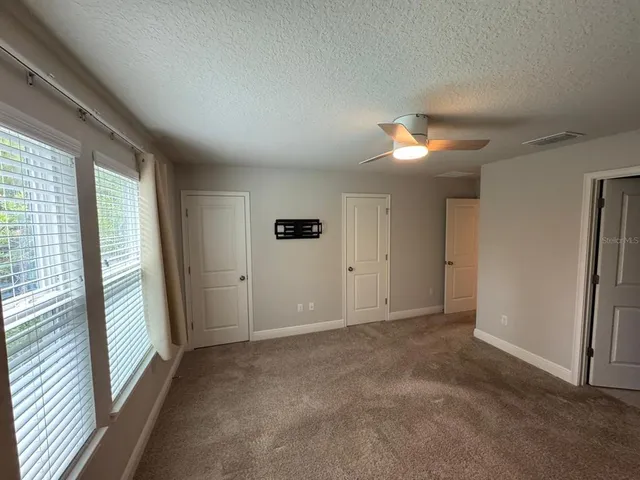 a view of a room with racks on the wall