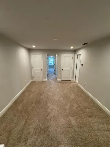 a view of a livingroom with a staircase