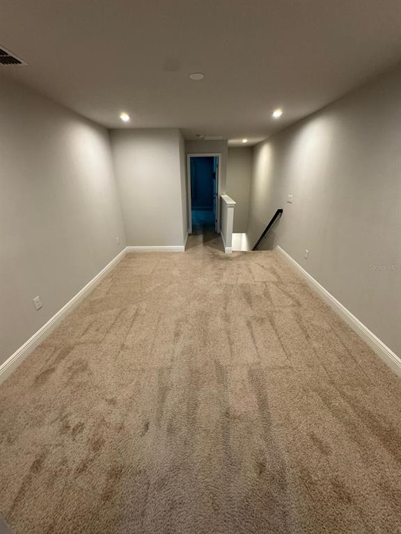 5912 Grand Sonata Avenue Lutz, FL 33558 - Photo 22 of 36 a view of a livingroom with a staircase
