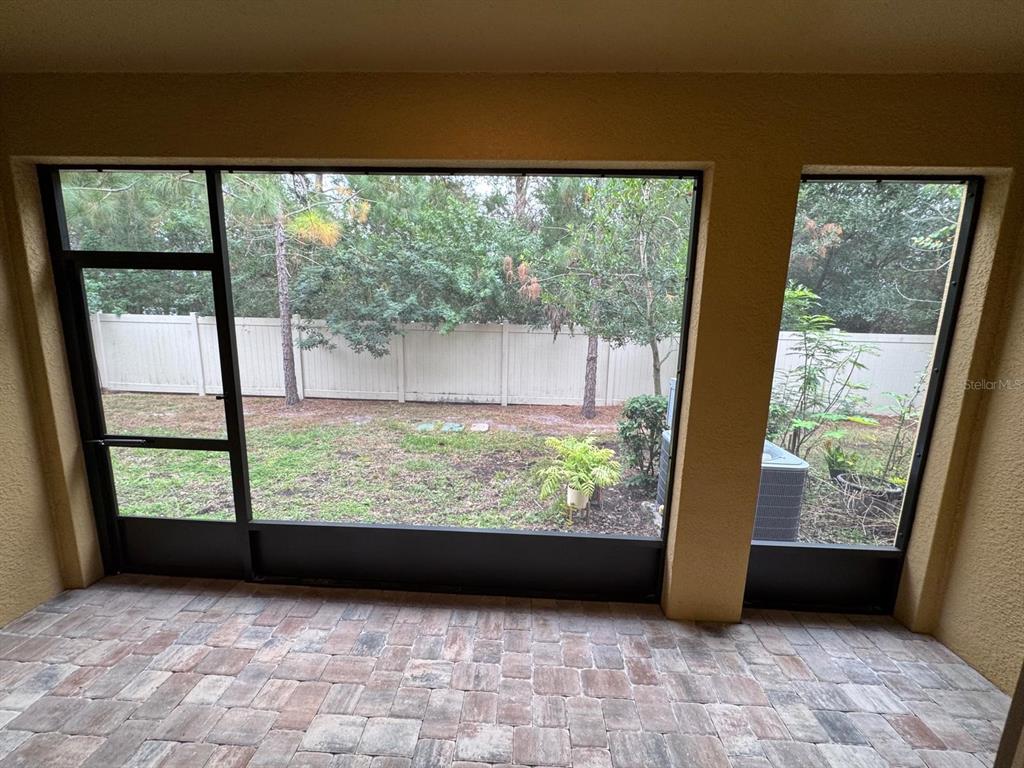 5912 Grand Sonata Avenue Lutz, FL 33558 - Photo 28 of 36 a view of empty room with front door