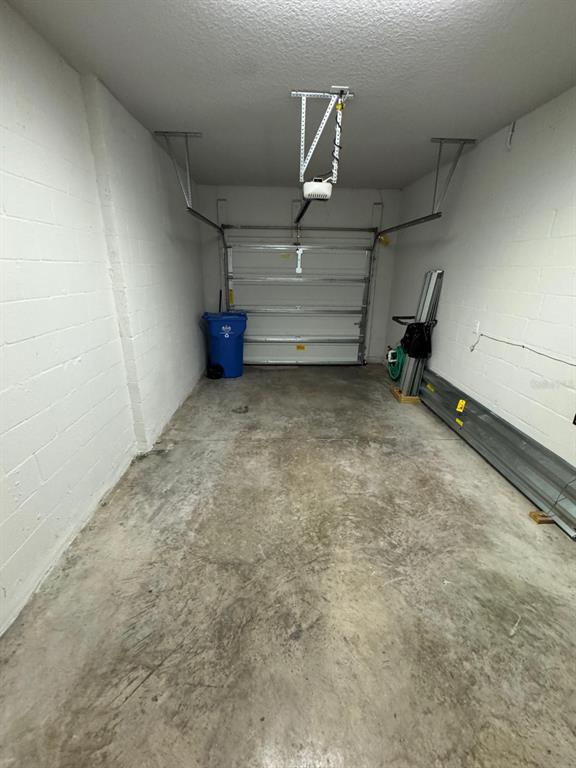 5912 Grand Sonata Avenue Lutz, FL 33558 - Photo 29 of 36 a view of a garage