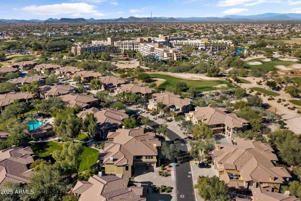 an aerial view of a city with lots of residential buildings