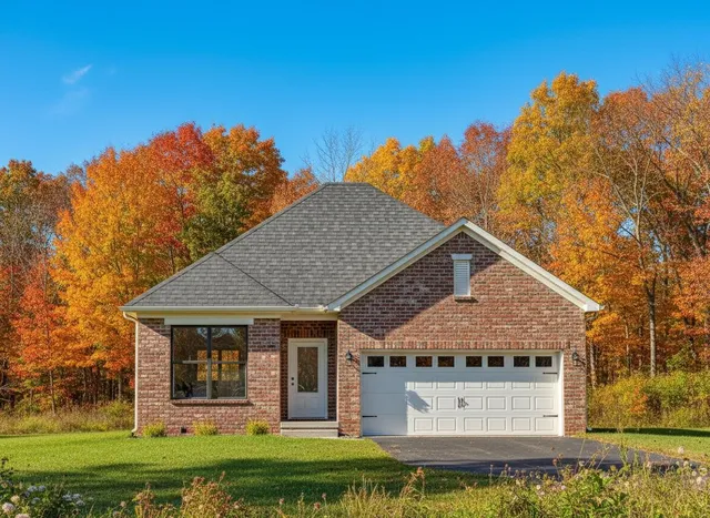 front view of a house with a yard