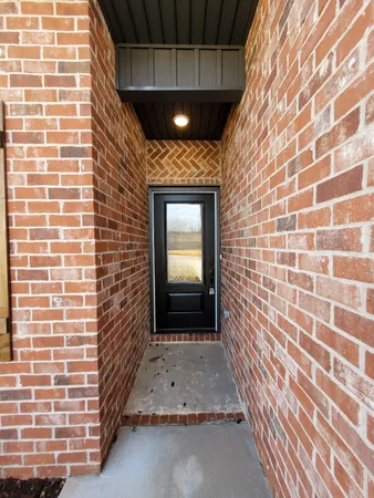 a kitchen with a refrigerator a stove a sink dishwasher and a refrigerator with wooden floor