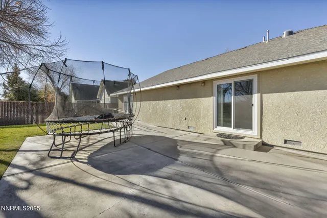 an aerial view of residential houses and outdoor space