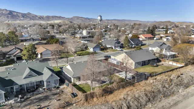 a view of an entryway with wooden floors