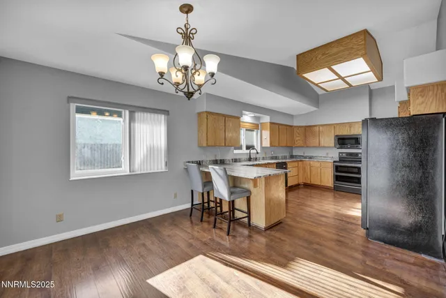 a bathroom with a sink a mirror and a shower