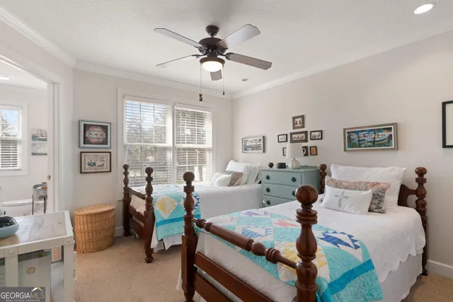 a bedroom with a bed and a table