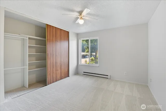 an empty room with a bathroom