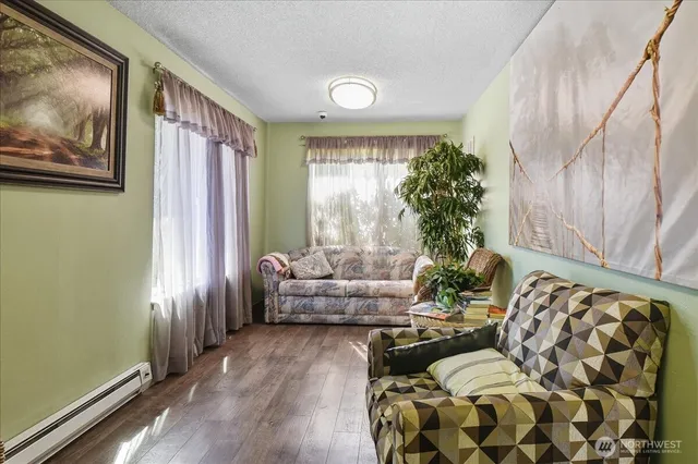 a view of a swimming pool and a yard