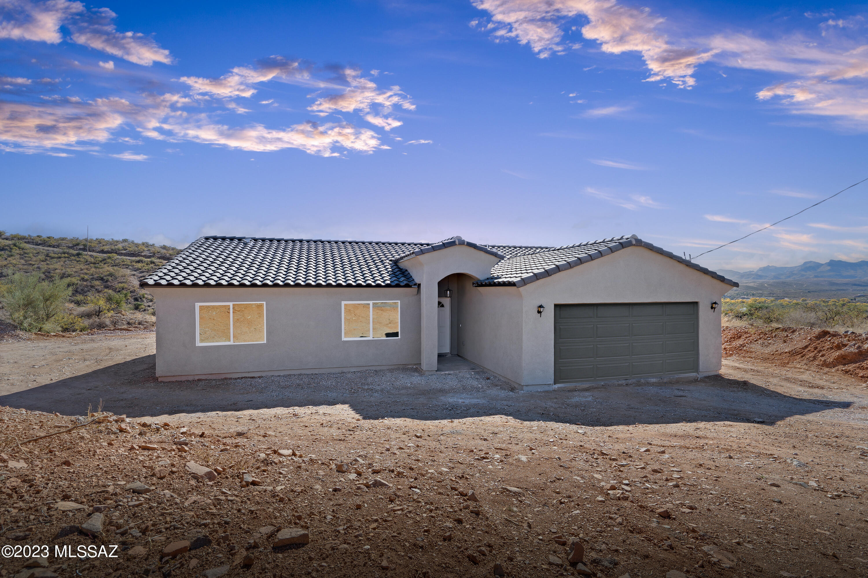 197 Camino Oceano Rio Rico, AZ 85648 - Photo 1 of 1 a front view of a house with a yard